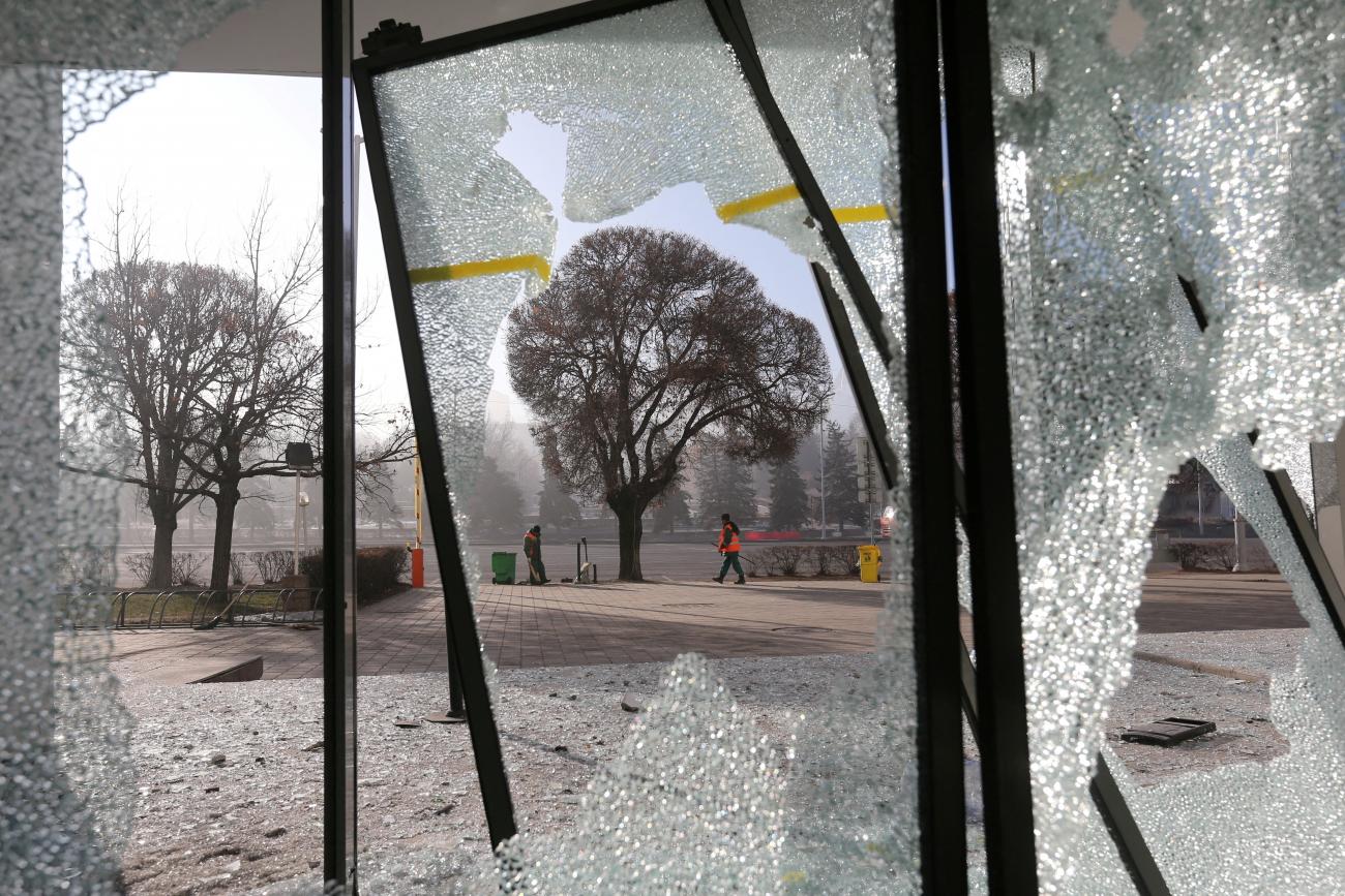 A view of barren trees is seen through windows shattered during recent protests triggered by a fuel price increase in Almaty, Kazakhstan, on January 12, 2022. 