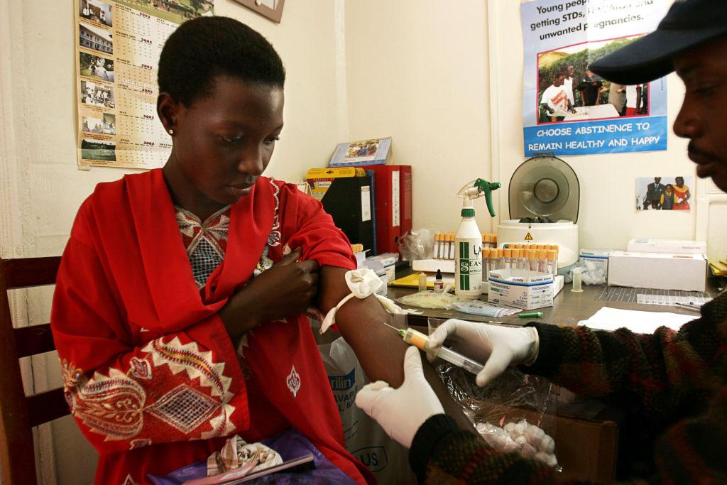An unidentified young woman is tested for HIV at the Naguru Teenage Health Centre, in Kampala, Uganda, An unidentified young woman is tested for HIV at the Naguru Teenage Health Centre on May 23, 2005