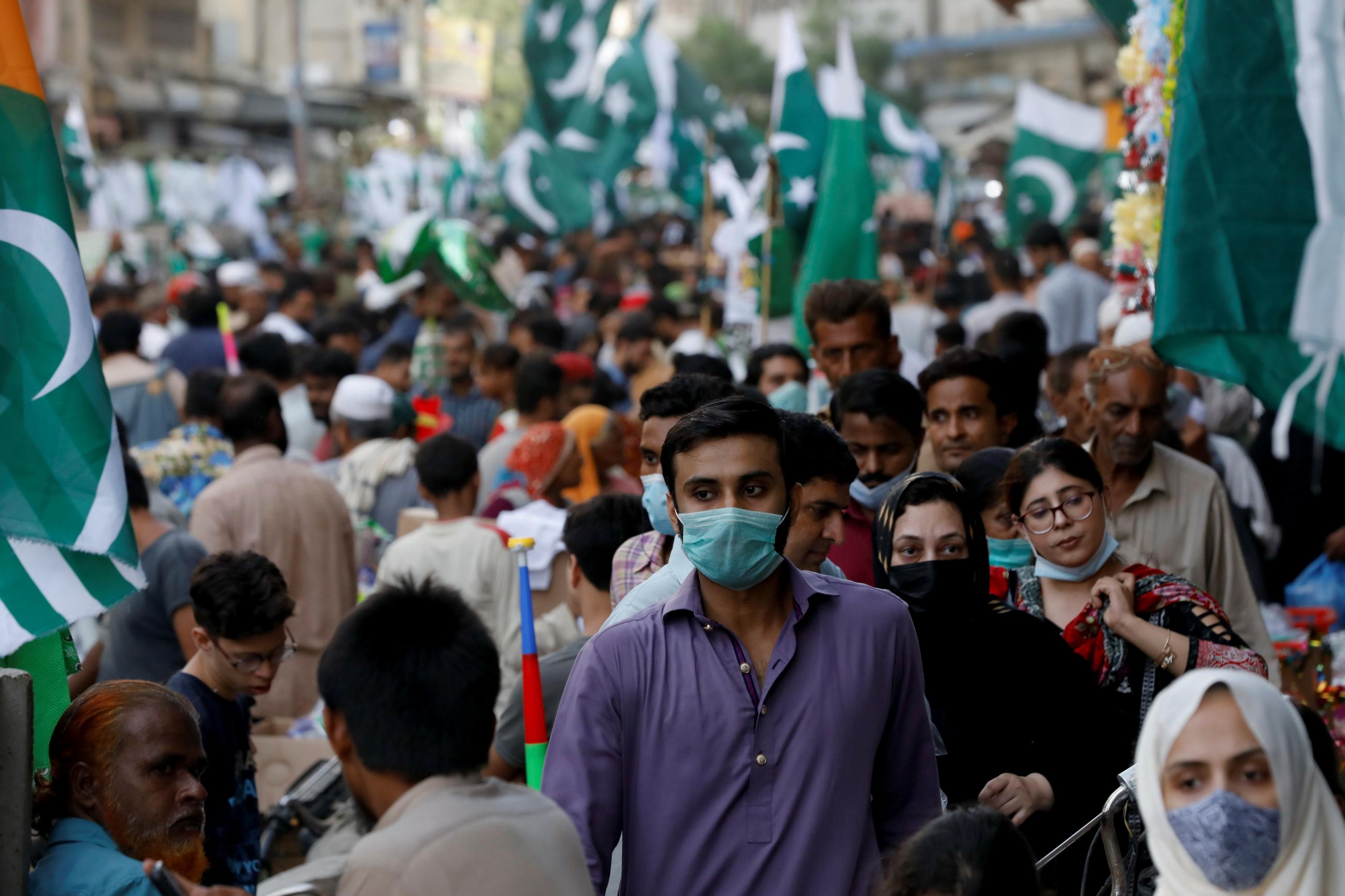 A busy street a few days ahead of Pakistan's Independence Day, amid the COVID pandemic in Karachi, Pakistan, on August 11, 2021.