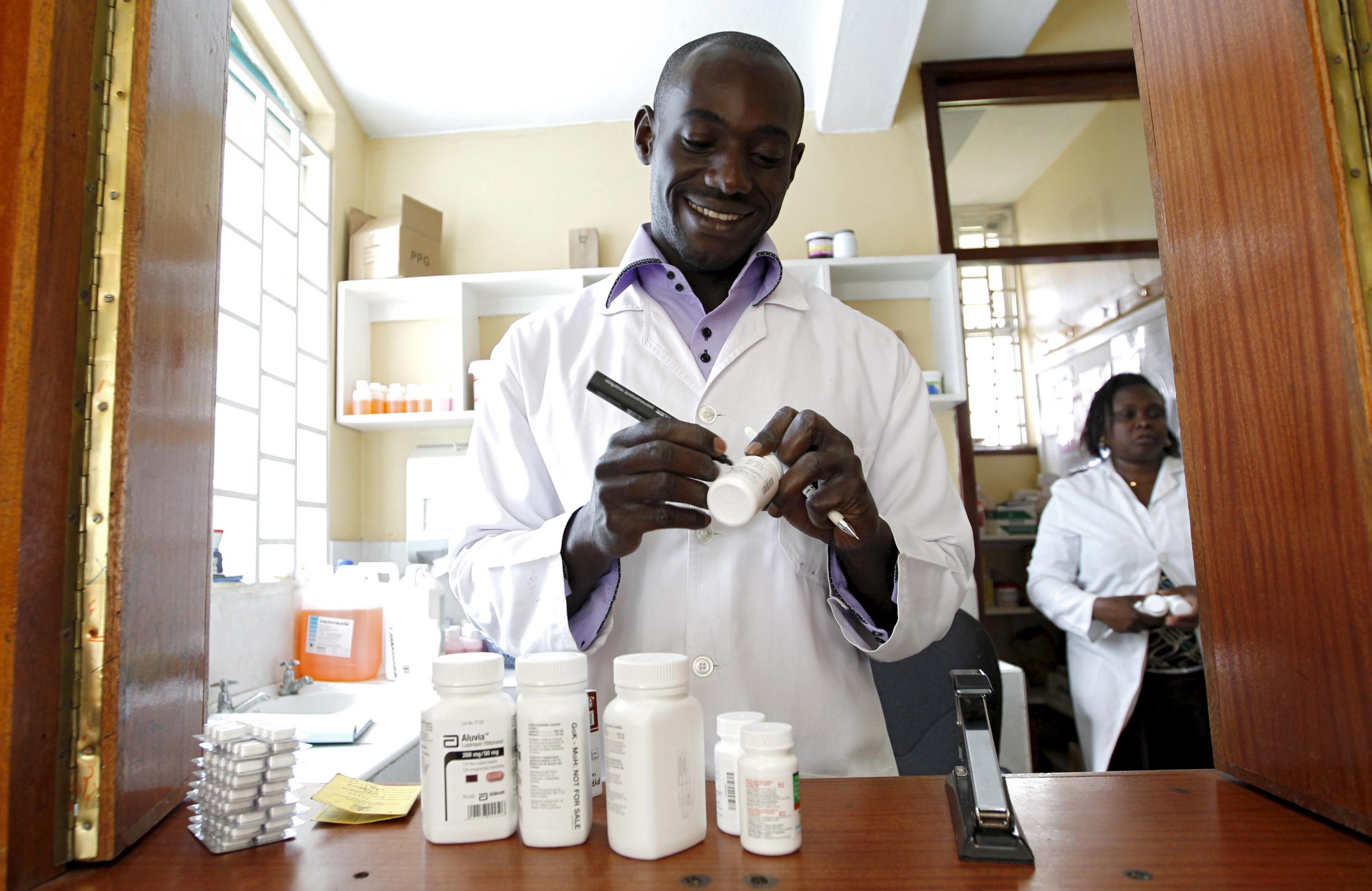 Michael Otieno, a pharmacist, dispenses anti-retroviral drugs at the Mater Hospital in Nairobi, Kenya, on September 10, 2015.
