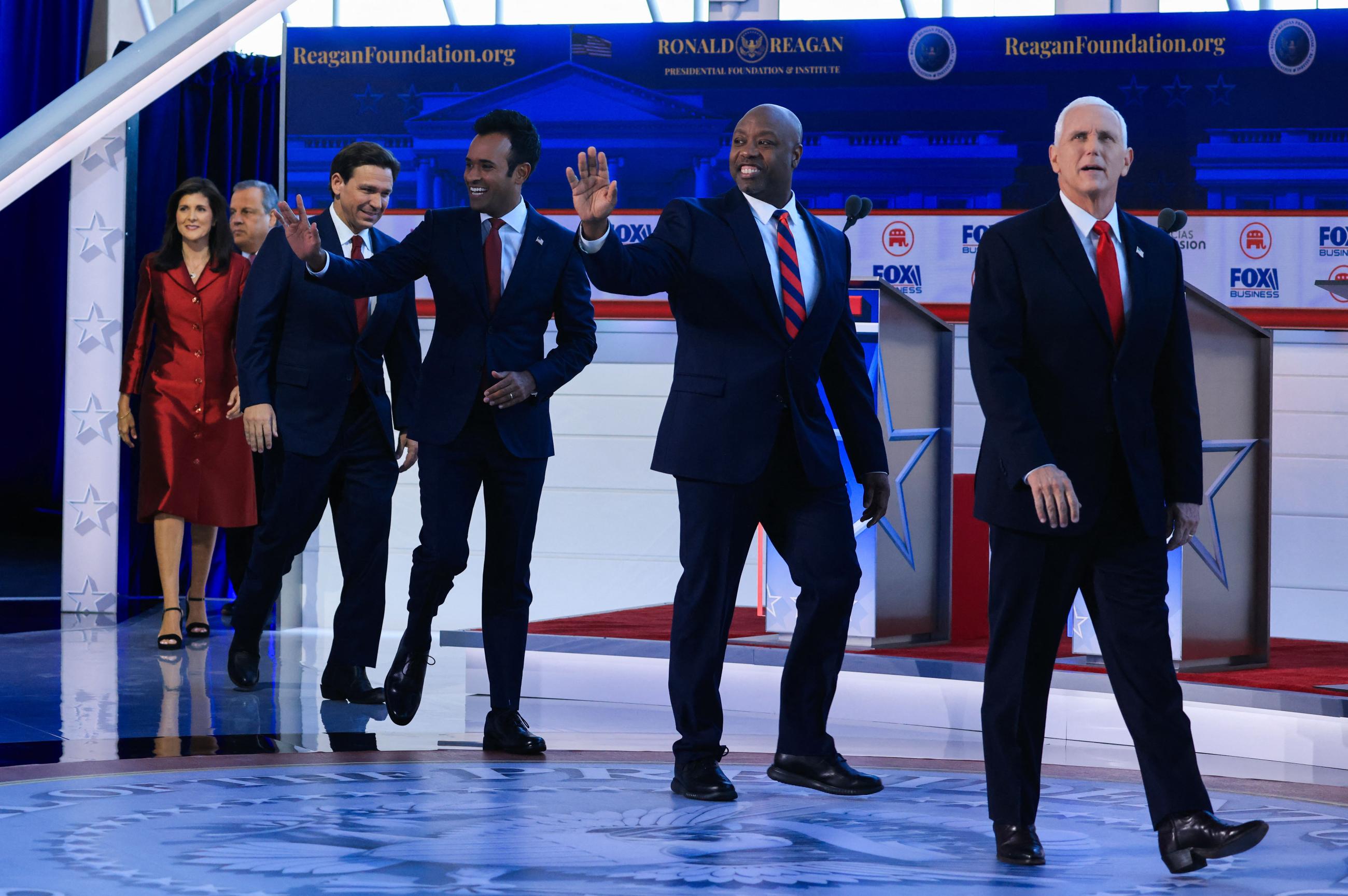 Former U.S. Vice President Mike Pence, U.S. Senator Tim Scott (R-SC), former biotech executive Vivek Ramaswamy, Florida Governor Ron DeSantis, former South Carolina Governor Nikki Haley and former New Jersey Governor Chris Christie arrive onstage for the second Republican candidates' debate of the 2024 U.S. presidential campaign at the Ronald Reagan Presidential Library in Simi Valley, California, U.S. September 27, 2023.