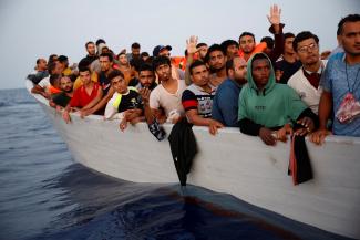 Multiple migrants in a boat.