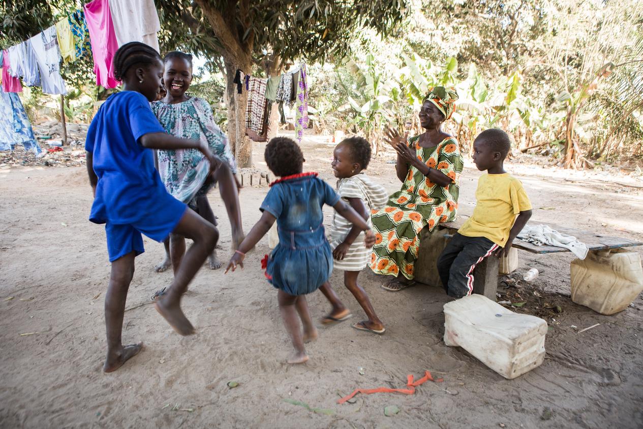 Sarjo with her grandchildren following successful surgery for advanced trachoma (trichiasis). Sarjo lost the sight in one eye many years ago and then developed trichiasis in her good eye. 