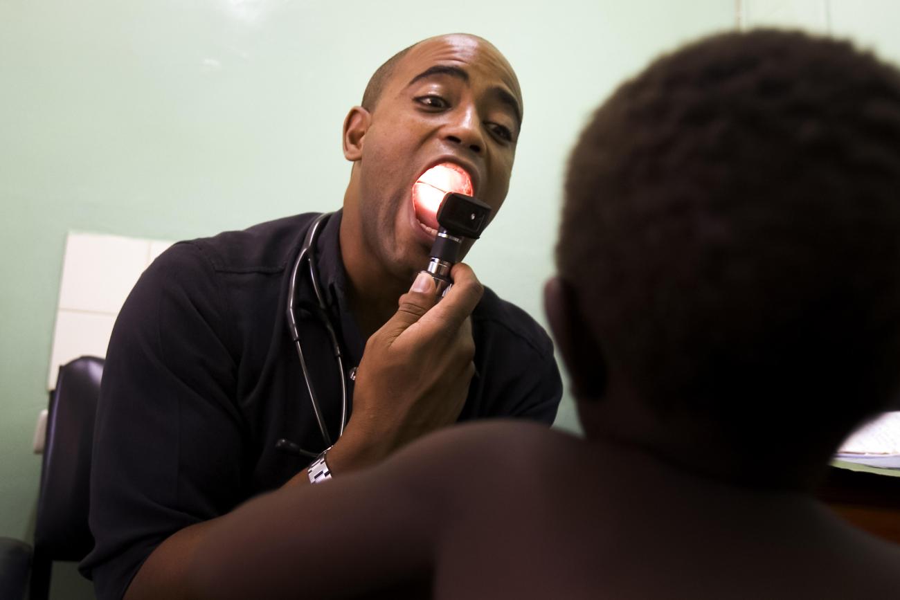 A physician visits with a patient in Malawi, at the Texas Children’s Global Health Network, the largest pediatric HIV treatment program. 