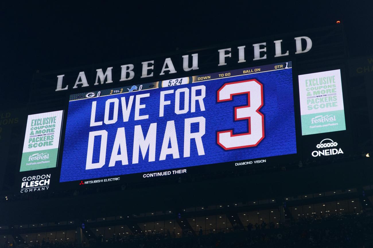 A tribute to Damar Hamlin is shown on the scoreboard prior to the game between the Detroit Lions and Green Bay Packers at Lambeau Field