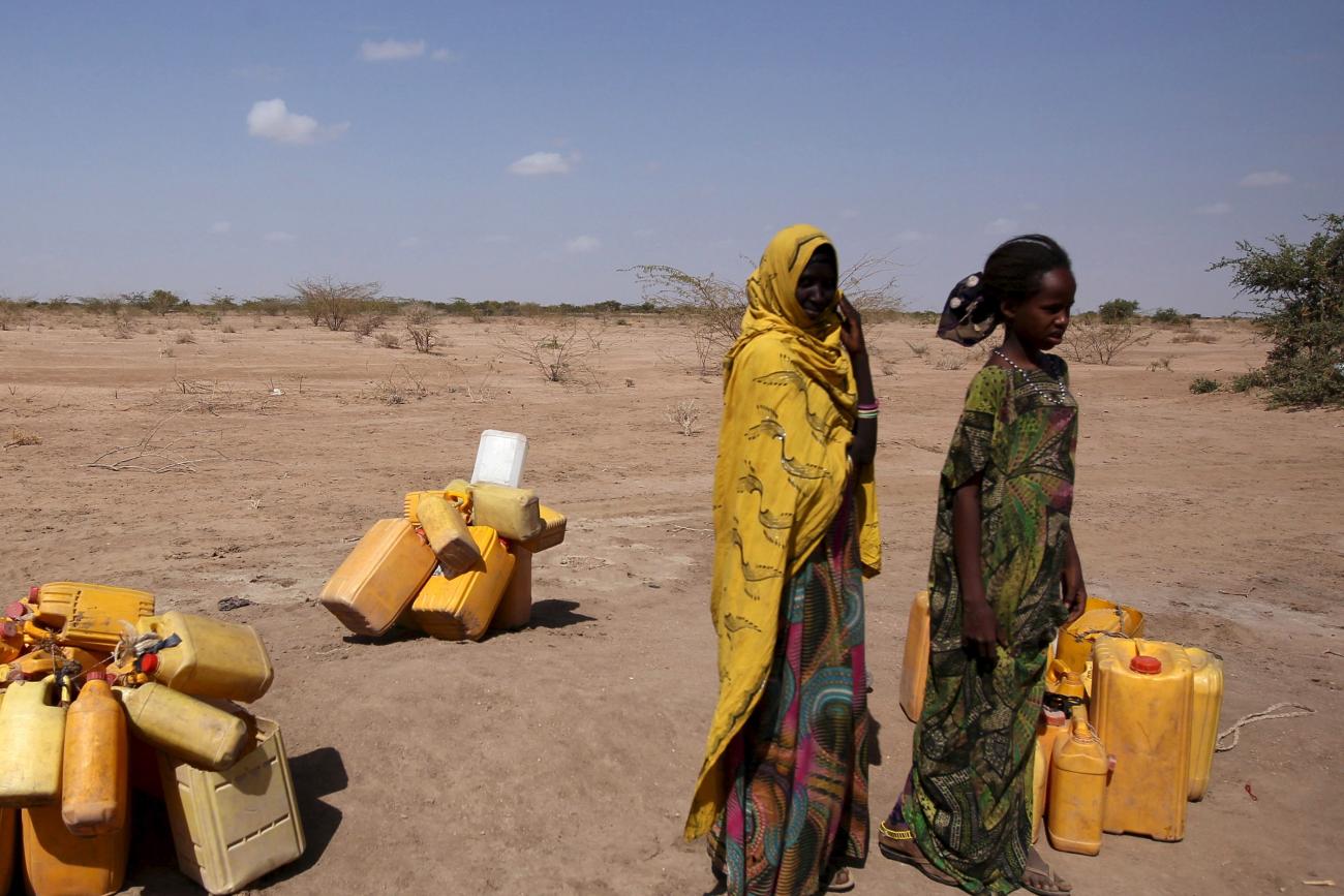 Women wait to collect water in the drought stricken Somali region.