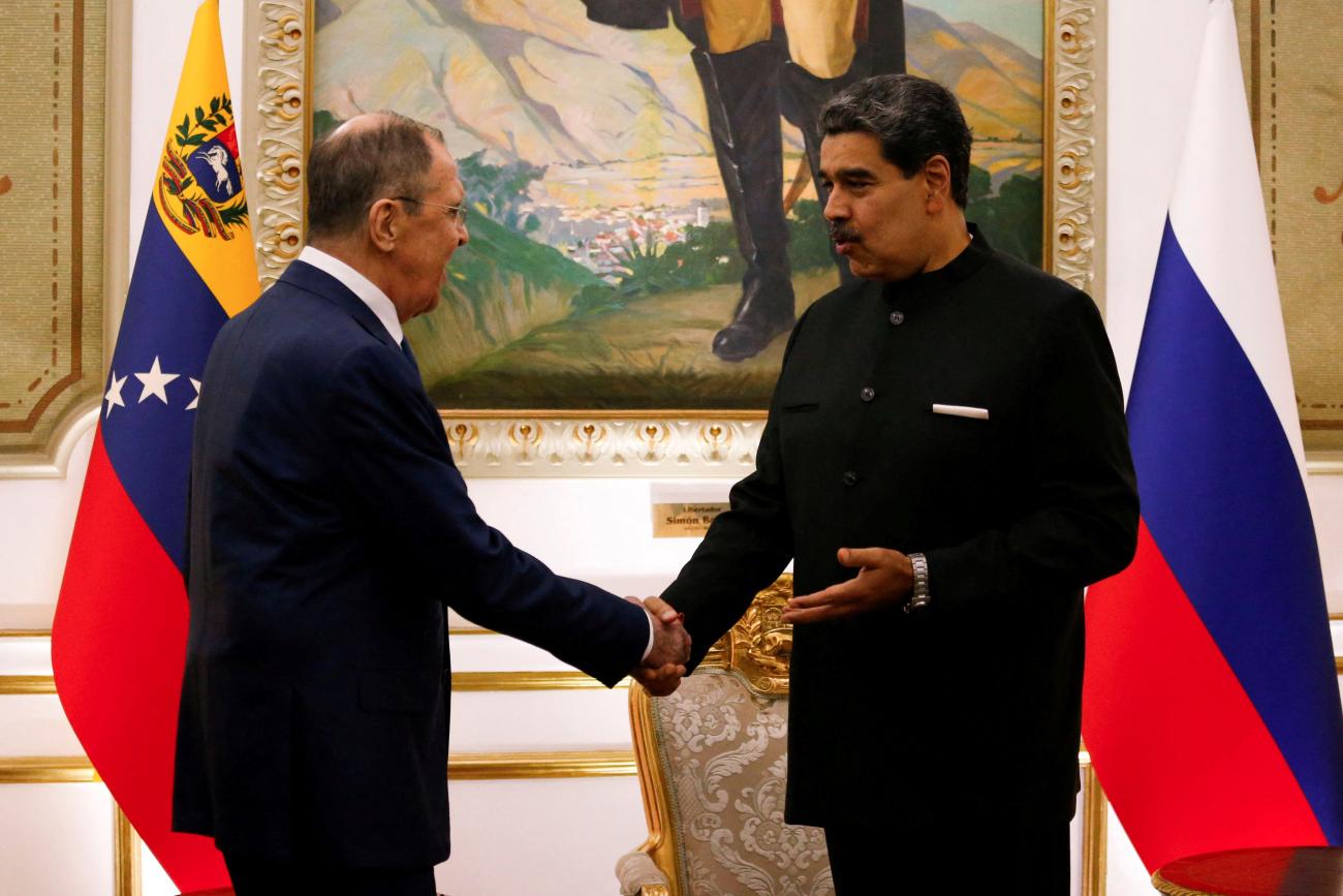 Venezuela's President Nicolas Maduro shakes hands with Russia's Foreign Minister Sergei Lavrov at Miraflores Palace, in Caracas, Venezuela February 20, 2024.