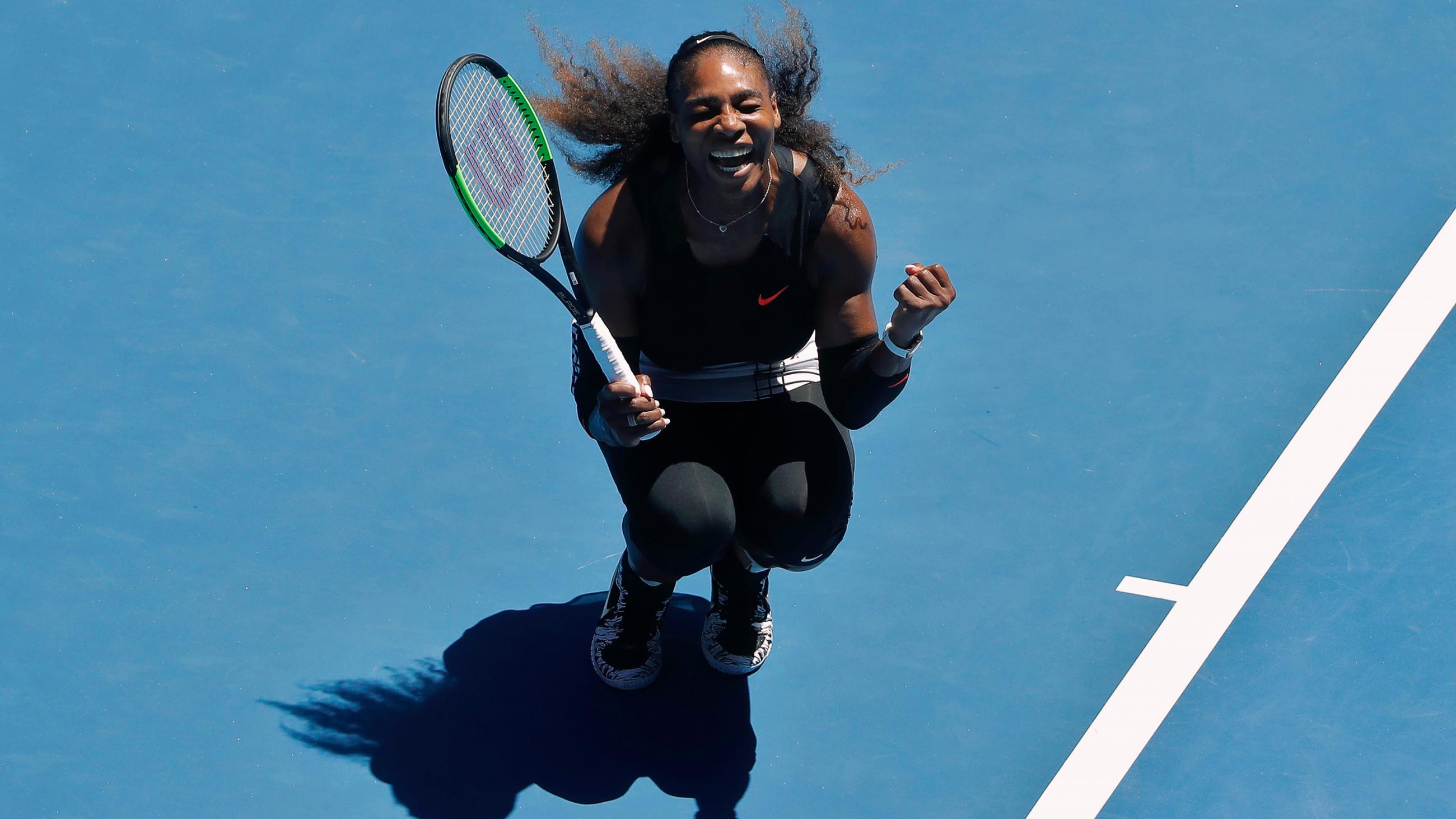 Photo shows the tennis star shouting and clenching her fists in victory. 