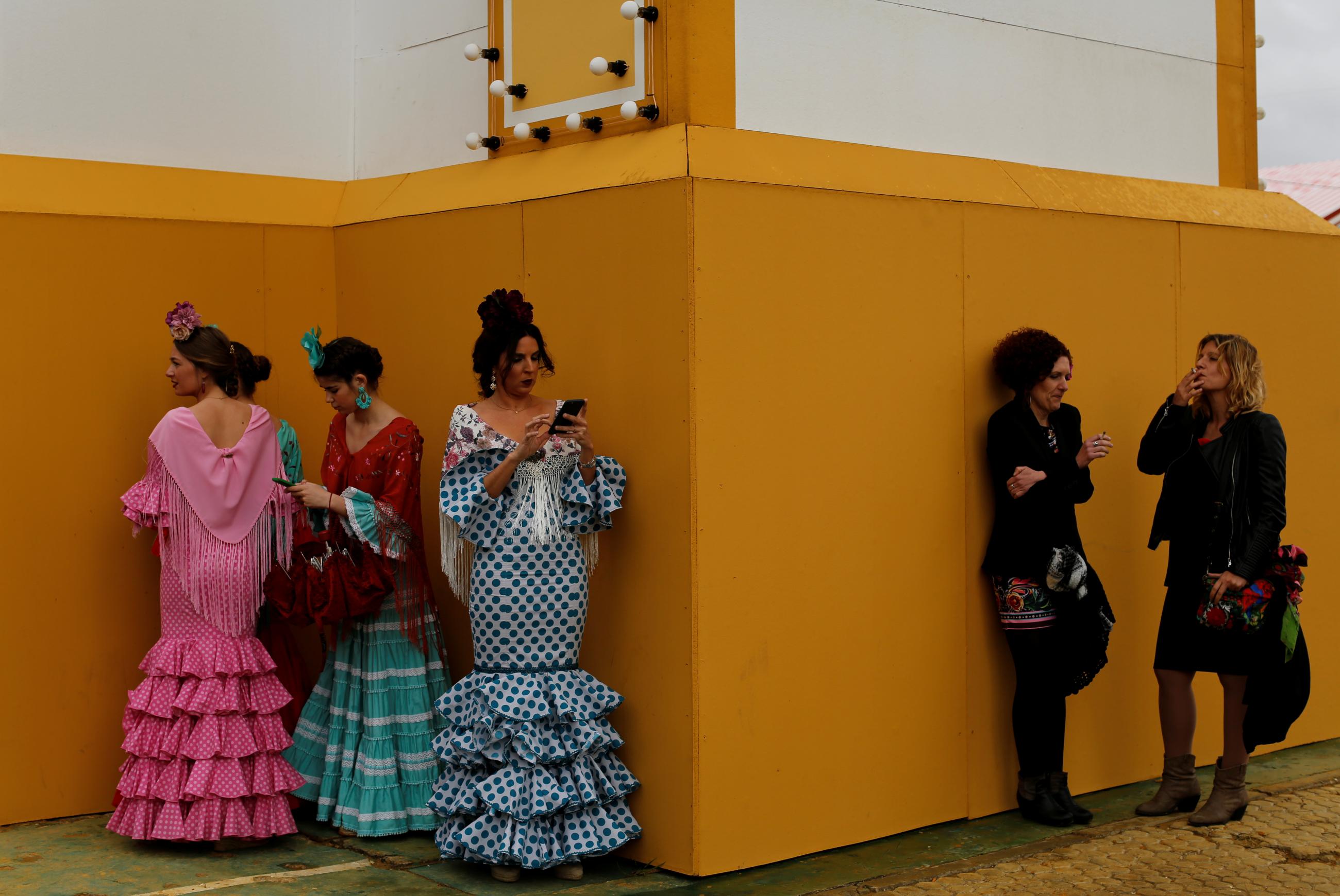 Women smoke cigarettes in Seville, Spain on April 12, 2016. REUTERS/Marcelo del Pozo