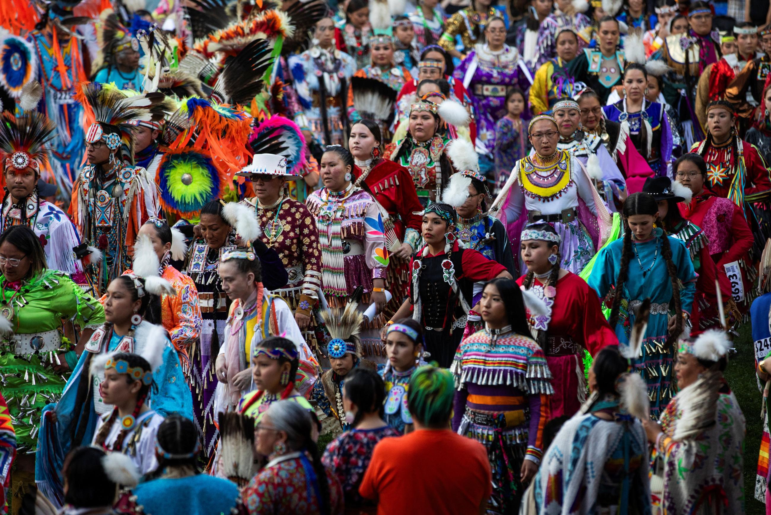 Dancers take part in the grand entry of the 43rd annual Kamloopa Powwow.