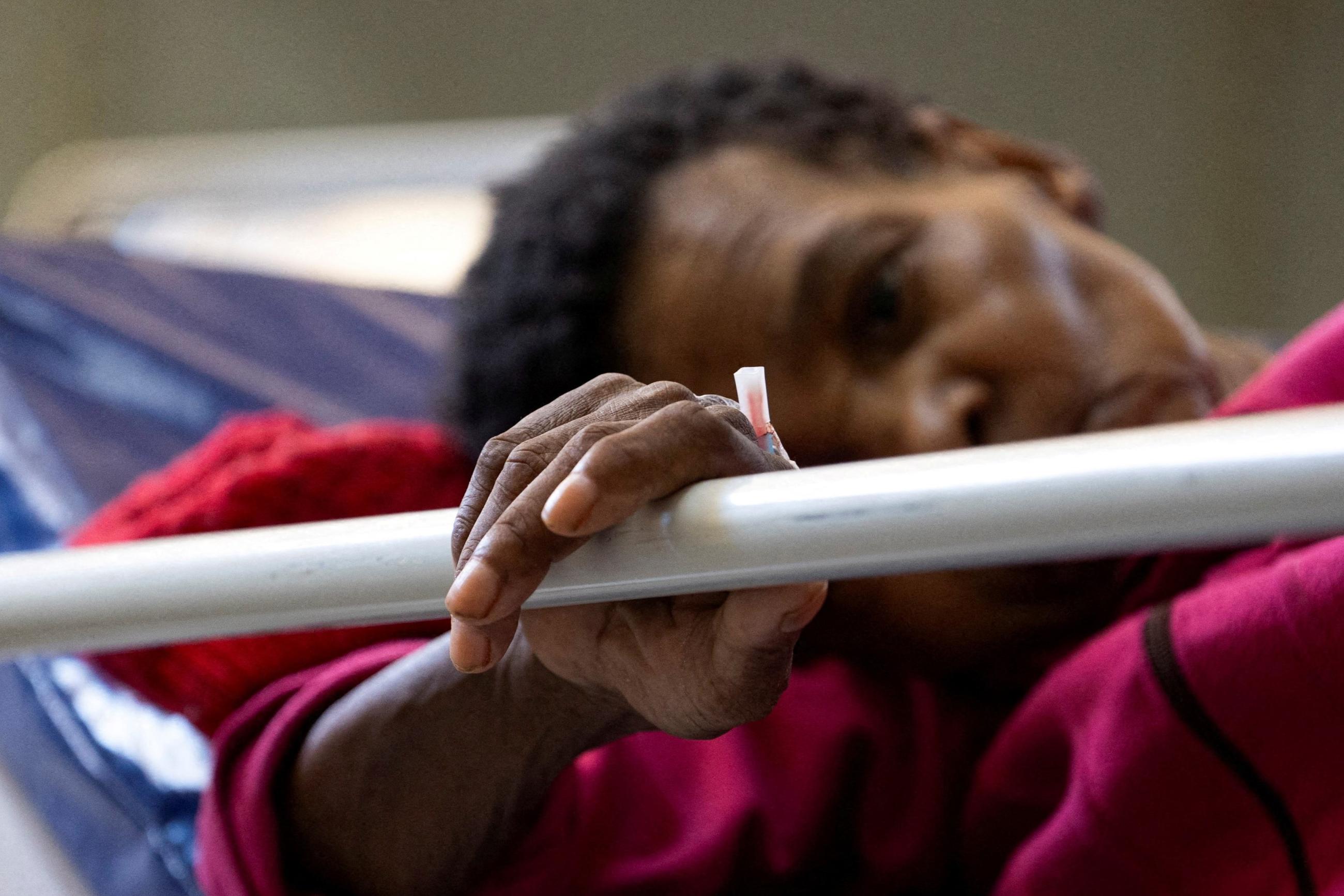 A patient waits in the emergency room of Klerksdorp Tshepong public district hospital