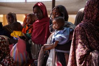 Women and babies are seen at the Zamzam displacement camp.