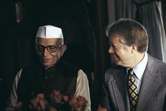 U.S. President Jimmy Carter (right) speaking with Indian Prime Minister Morarji Desai during a luncheon, in New Delhi, India, on January 2, 1978.