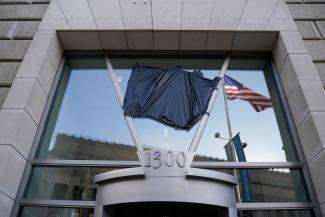 USAID signage is covered at the agency's headquarters in Washington, DC, on February 7, 2025.